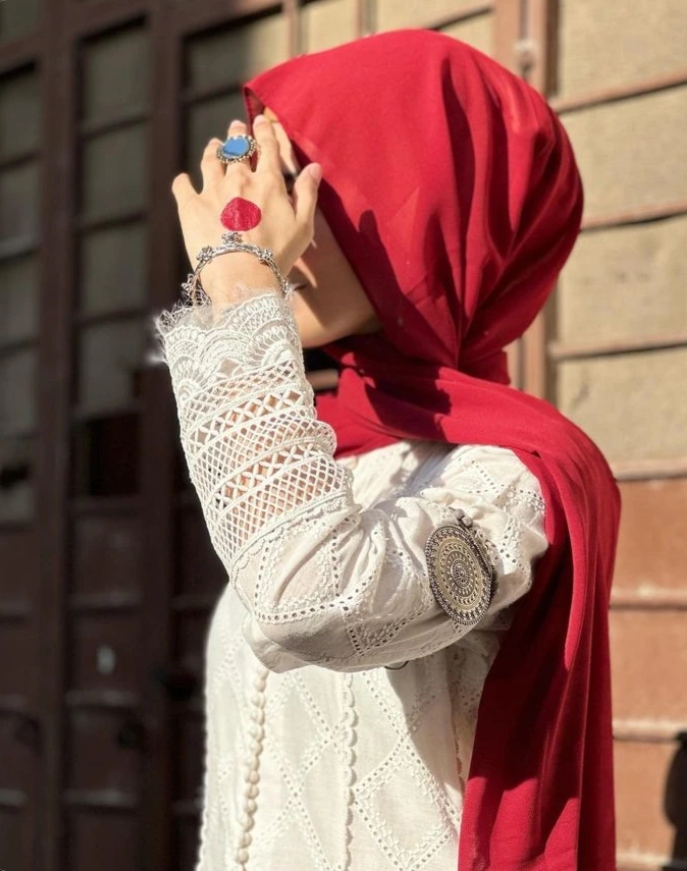 A My Stitching Service outfit with a detailed white lace sleeve and deep-red dupatta